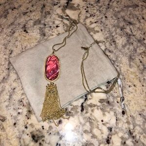 Kendra Scott long gold necklace with pink stone